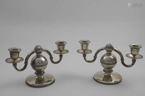 A PAIR OF LATE 20TH CENTURY TWIN-LIGHT DWARF CANDELABRA on s...