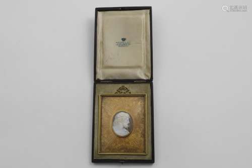 A CARVED CAMEO PORTRAIT OF CHRIST mounted in an engraved bra...