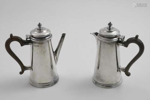 A PAIR OF EARLY 20TH CENTURY TAPERING CAFE AU LAIT POTS with...
