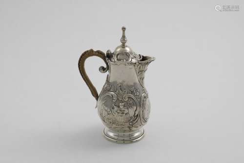 A SMALL LATE 19TH CENTURY CONTINENTAL HOT MILK JUG of balust...