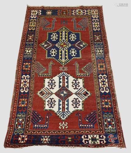 KAZAK RUG, Central Caucasus, circa 1900. The madder field wi...