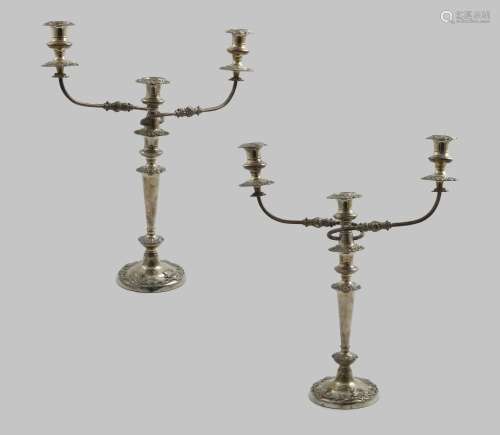 A PAIR OF LATE PERIOD OLD SHEFFIELD PLATED THREE-LIGHT CANDE...