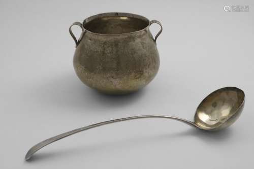 A 19TH CENTURY TWO-HANDLED CUP shaped like a cauldron, unmar...