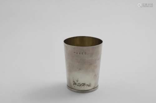 A GEORGE III BEAKER plain tapering form with a reeded base &...