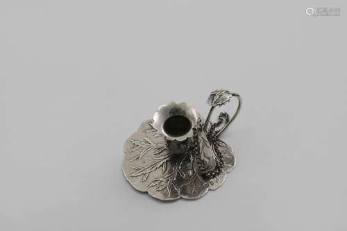 A WILLIAM IV SMALL NATURALISTIC CHAMBERSTICK with a conical ...