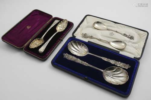 A LATE VICTORIAN CASED PAIR OF DECORATIVE, FRUIT SERVING SPO...