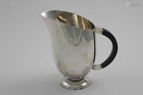 A WW2 PERIOD HANDMADE WATER EWER OR PITCHER helmet-shaped wi...