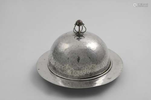 AN ART & CRAFTS ELECTROPLATED MUFFIN DISH & COVER with a ham...