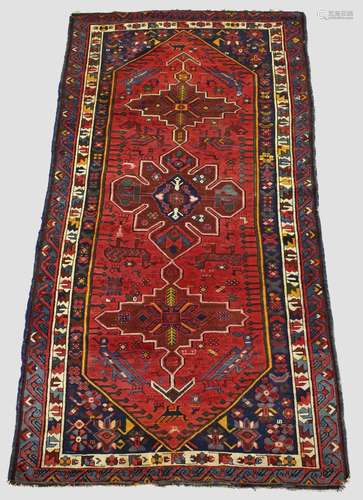 SEYCHOUR RUG, East Caucasus, circa 1910. The brick red elong...