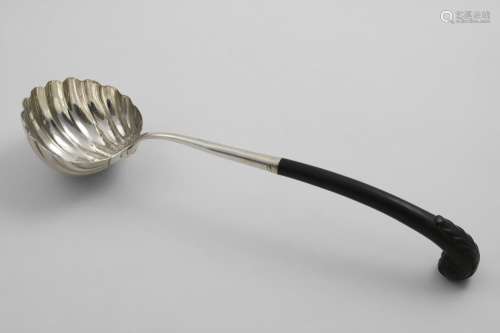 A GEORGE II SOUP LADLE with a fluted circular bowl, a double...