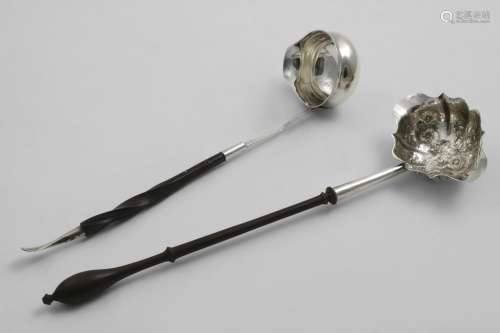 A LATE GEORGE II DOUBLE-LIPPED PUNCH LADLE with a turned woo...