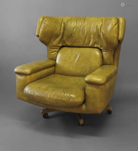 RETRO LEATHER SWIVEL CHAIR circa 1970's, a lime green leathe...