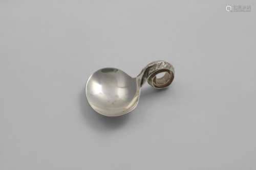 A LATE 20TH CENTURY CADDY SPOON with an oval bowl and a coil...