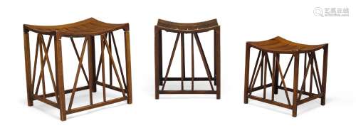 Liberty & Co (British), a graduated matched trio of mahogany...