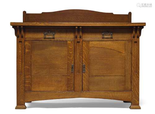Arts & Crafts, an oak and inlaid sideboard c.1900, applied l...
