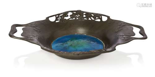 Liberty & Co (British), a pewter bowl with enamelled centre ...