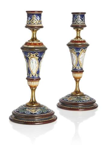 Doulton (British), a pair of Lambeth stoneware candlesticks ...