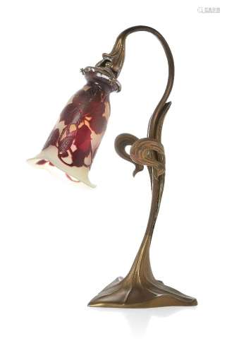 An Art Nouveau brass table lamp with a Gallé cameo glass lig...