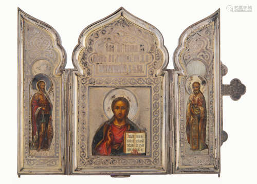 AN IMPERIAL RUSSIAN SILVER-MOUNTED PRESENTATION ICON TRIPTYC...