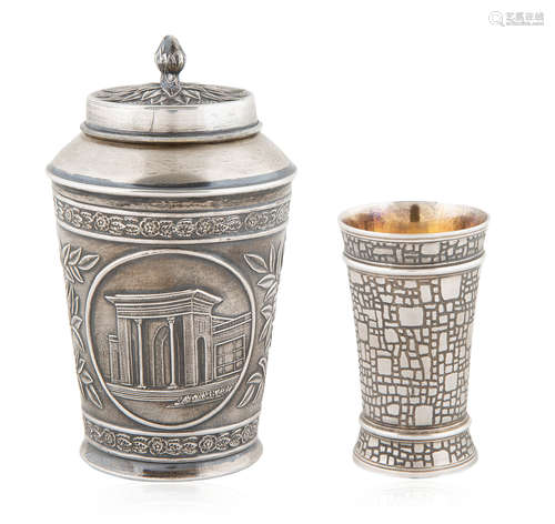 A SILVER RUSSIAN CUP AND TEA STRAINER