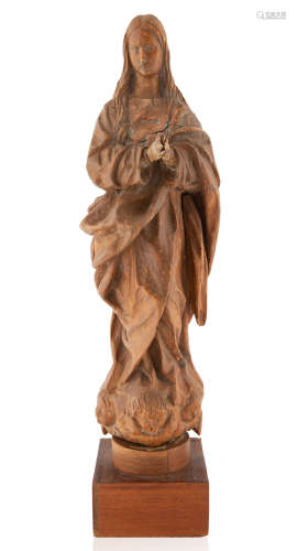 A CARVED WOODEN FIGURE OF THE IMMACULATE VIRGIN, MOST LIKELY...