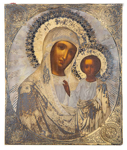 A RUSSIAN ICON OF THE KAZANSKAYA MOTHER OF GOD WITH SILVER O...