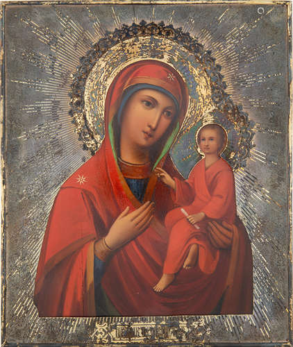 A RUSSIAN ICON OF THE IVERSKAYA MOTHER OF GOD WITH SILVER OK...