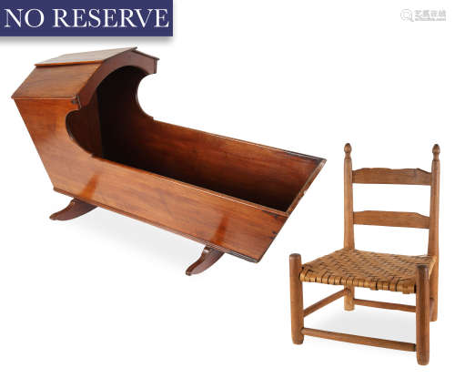 AN AMERICAN HOODED MAHOGANY ROCKING CRADLE AND A WOODEN AMER...