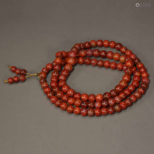 A GROUP OF RED AGATE BUDDHIST BEADS, QING DYNASTY, CHINA