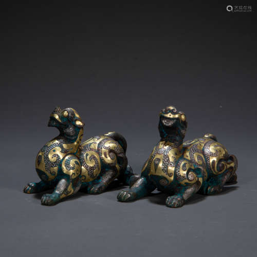 A PAIR OF WRONG GOLDEN BEASTS, HAN DYNASTY, CHINA