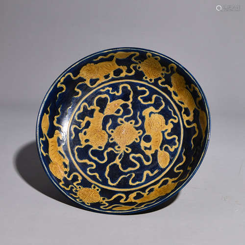 A BLUE GLAZEDC LION PATTERNEDC PLATE