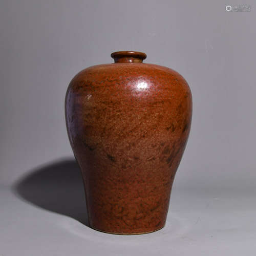 A REDC GLAZEDC PLUM PATTERNEDC BOTTLE