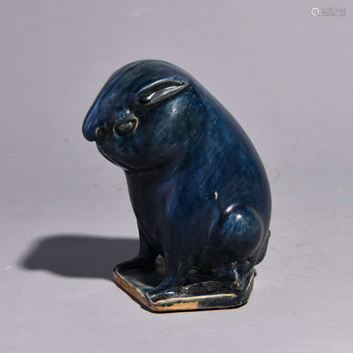 A BLUE GLAZEDC RABBIT OF DCING KILN