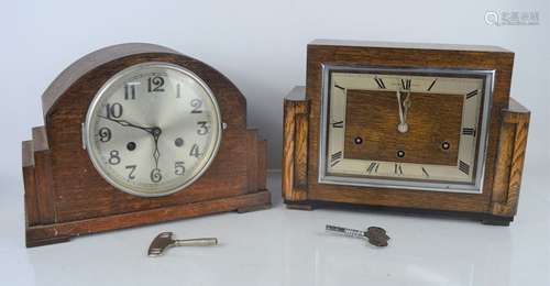 A Walker and Hall mantel clock together with a 1930s oak exa...