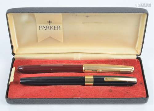 A vintage Parker pen with a 12ct rolled gold lid together wi...