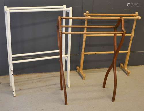 Three towel rails, including one in mahogany and one in pine...