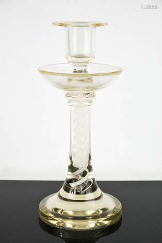 A Georgian style glass candlestick with spiral decoration to...