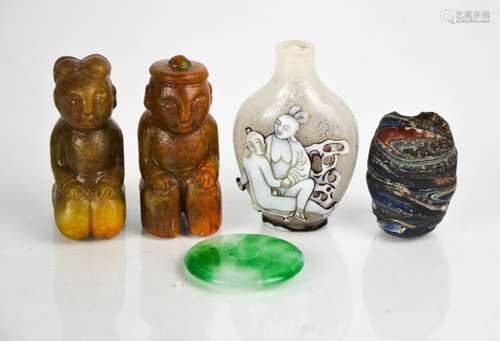 A Chinese 'erotica' scent bottle, jade amulet and two jade c...