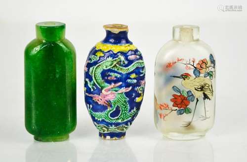 Three Chinese scent bottles, one in jade, one reverse painte...