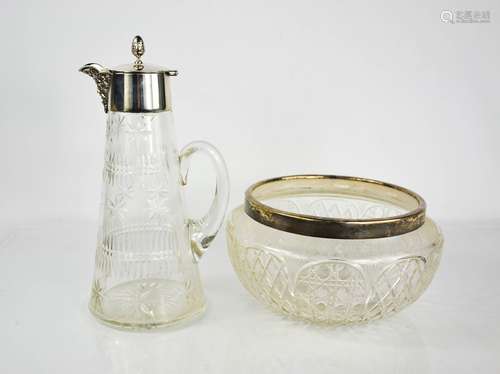 A silver and glass claret jug, the silver lid having acorn f...