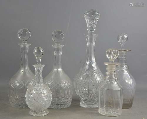 A group of six cut glass decanters of various style and form...