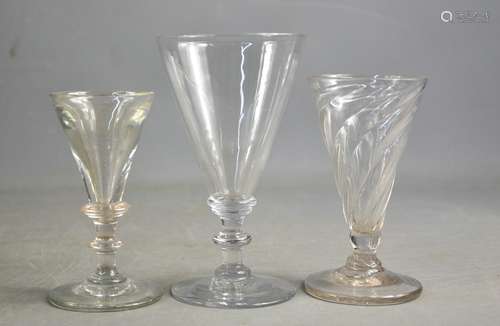 Three Georgian glasses, one of spiral form, and two with kno...