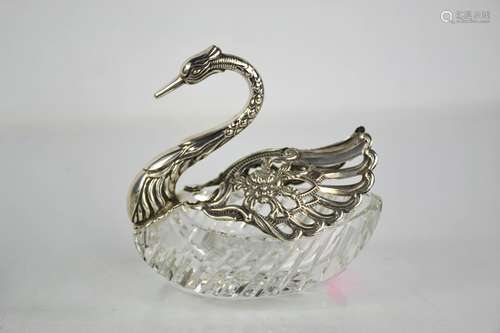 A white metal and cut crystal dish in the form of a swan, st...