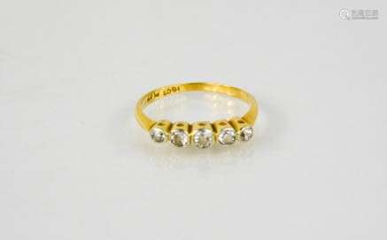 An 18ct gold and diamond half hoop eternity ring, comprising...