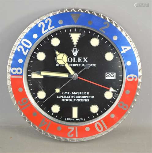 A Rolex red and blue dealers display clock, wall hanging.