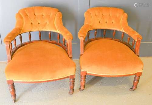 Two Victorian tub chairs upholstered in gold draylon, the ar...