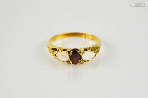 An 18ct (tested), ruby and opal ring, 3.63g.