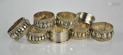 Eight silver and white metal napkin rings, including two 19t...