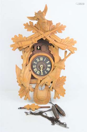 A wooden Swiss cuckoo clock