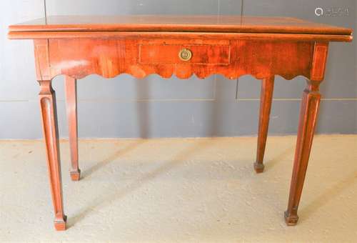 A Victorian mahogany fold over tea table with single drawer,...